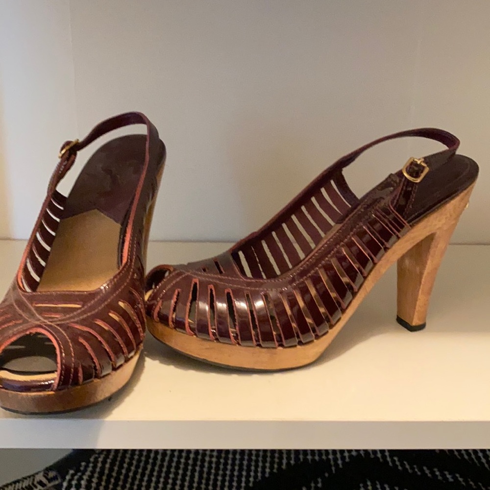Micheal Kors deep red patent platform sling back.